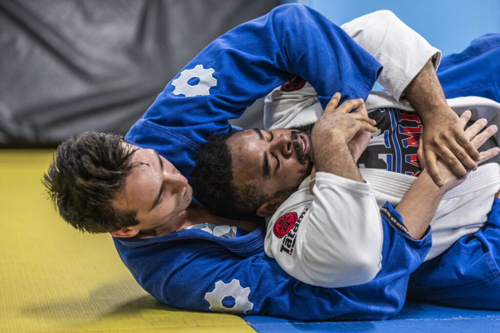 BJJ practitioner demonstrating arm control in a sparring session at London Fight Factory.
